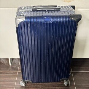 RIMOWA Blue Check-On Rolling Suitcase